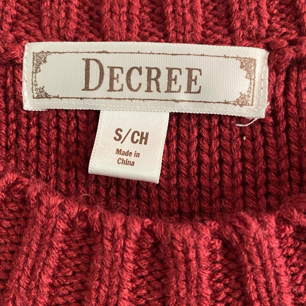 Decree burgundy sweater dress slim fitting. Very flattering on.